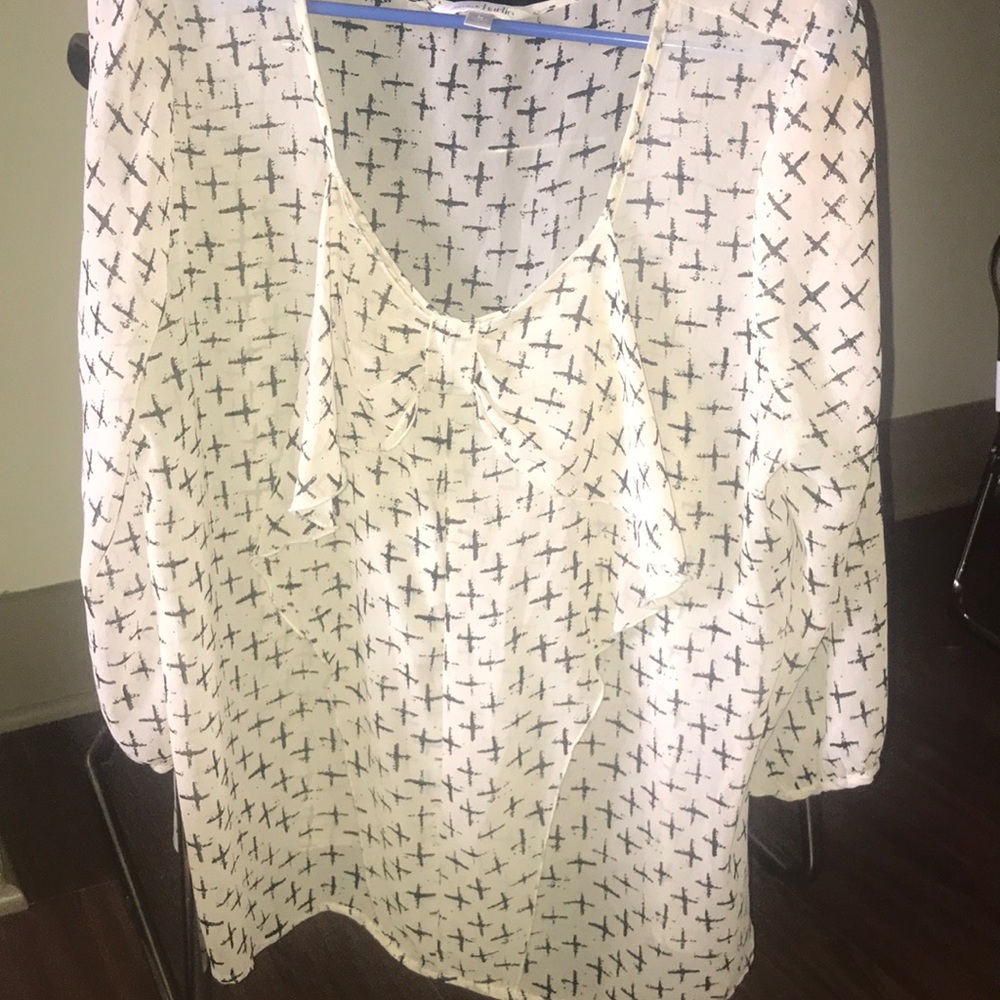 Sheer tan top with bow and cross-details
